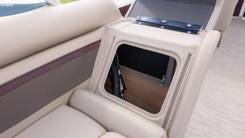 Slide: The Image of 2024 Bennington 20SSR boat seat with open storage compartment, beige upholstery. - 15