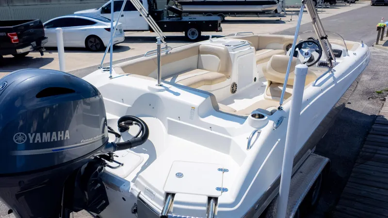 Slide: The Image of 2017 NauticStar 203 SC boat with Yamaha outboard motor, docked and ready for use. - 4