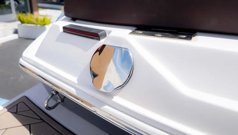 Slide: The Image of Rear view of a 2015 Regal 2500 boat with chrome detailing. - 8