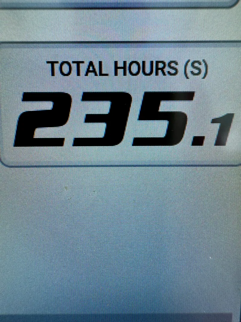 Slide: The Image of Display showing total hours as 235.1 on a 2023 Contender 35ST. - 14
