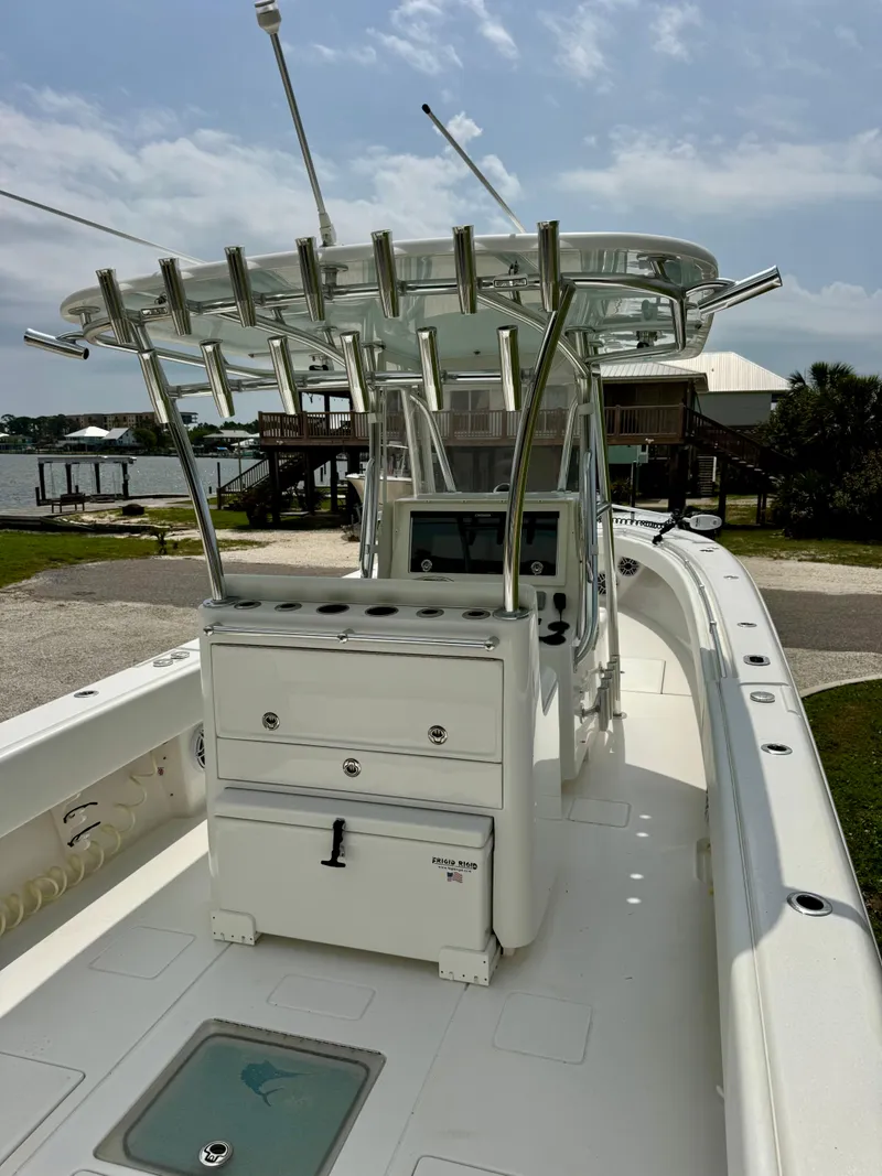 Slide: The Image of 2023 Contender 35ST boat with sleek design, spacious deck, and modern amenities. - 31