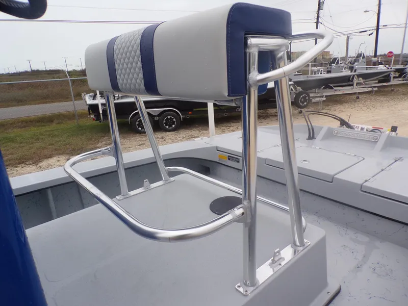 Slide: The Image of 2025 Freedom Warrior 23 boat seat with blue and gray upholstery, featuring sturdy metal frame. - 21