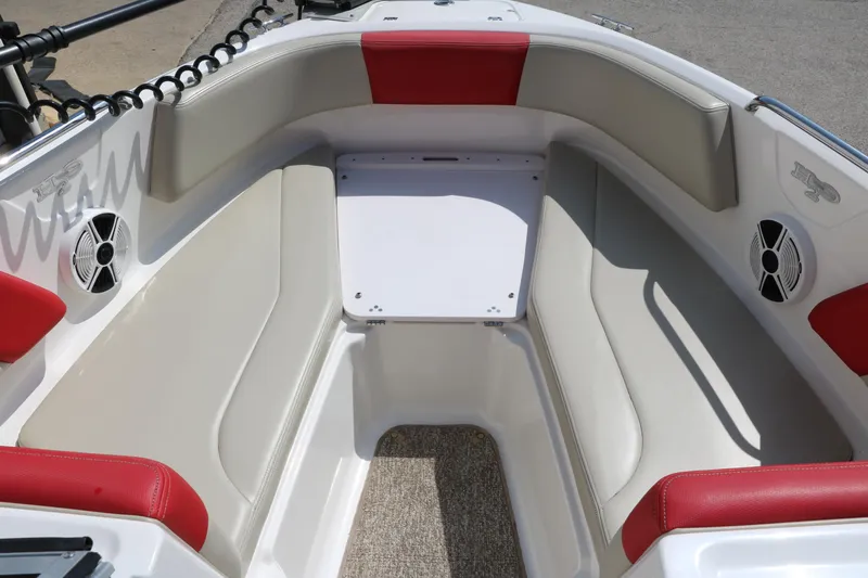 Slide: The Image of 2014 Chaparral 21 H2O Ski & Fish boat interior with red and beige seating. - 21