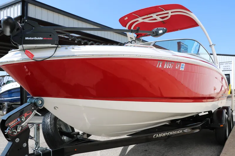 Slide: The Image of 2014 Chaparral 21 H2O Ski & Fish boat in vibrant red on trailer. - 7