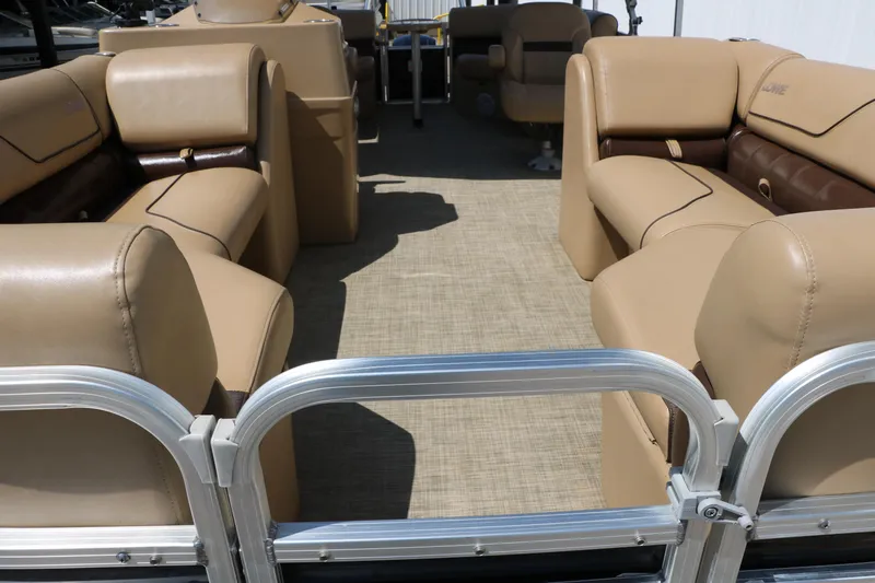 Slide: The Image of Pontoon boat interior with beige seating, Lowe SS210 model, 2019. - 16