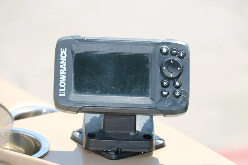Slide: The Image of Lowrance fish finder mounted on a 2019 Lowe SS210 boat dashboard. - 31