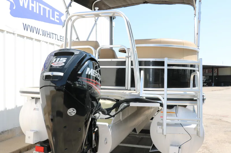 Slide: The Image of 2019 Lowe SS210 pontoon boat with Mercury 115 outboard motor, docked at marina. - 4