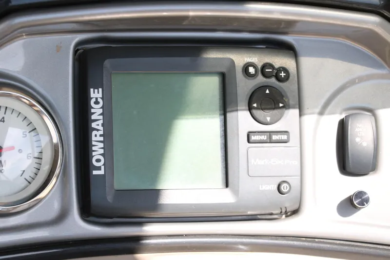 Slide: The Image of Lowrance marine GPS system on 2015 Sun Tracker Party Barge 20 DLX dashboard. - 25