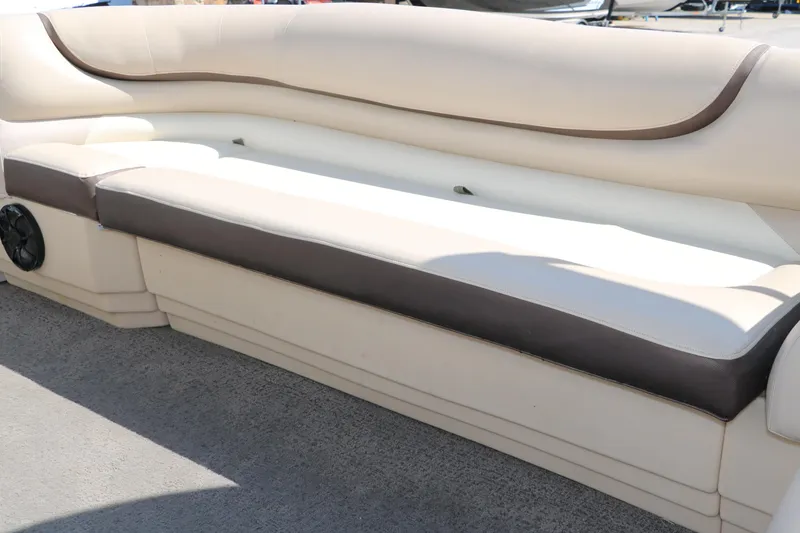 Slide: The Image of 2015 Sun Tracker Party Barge 20 DLX pontoon boat seating, beige and brown upholstery. - 27