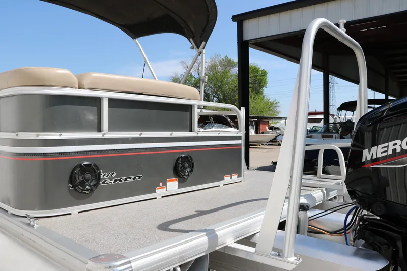 Slide: The Image of 2015 Sun Tracker Party Barge 20 DLX pontoon boat with Mercury engine, docked outdoors. - 7