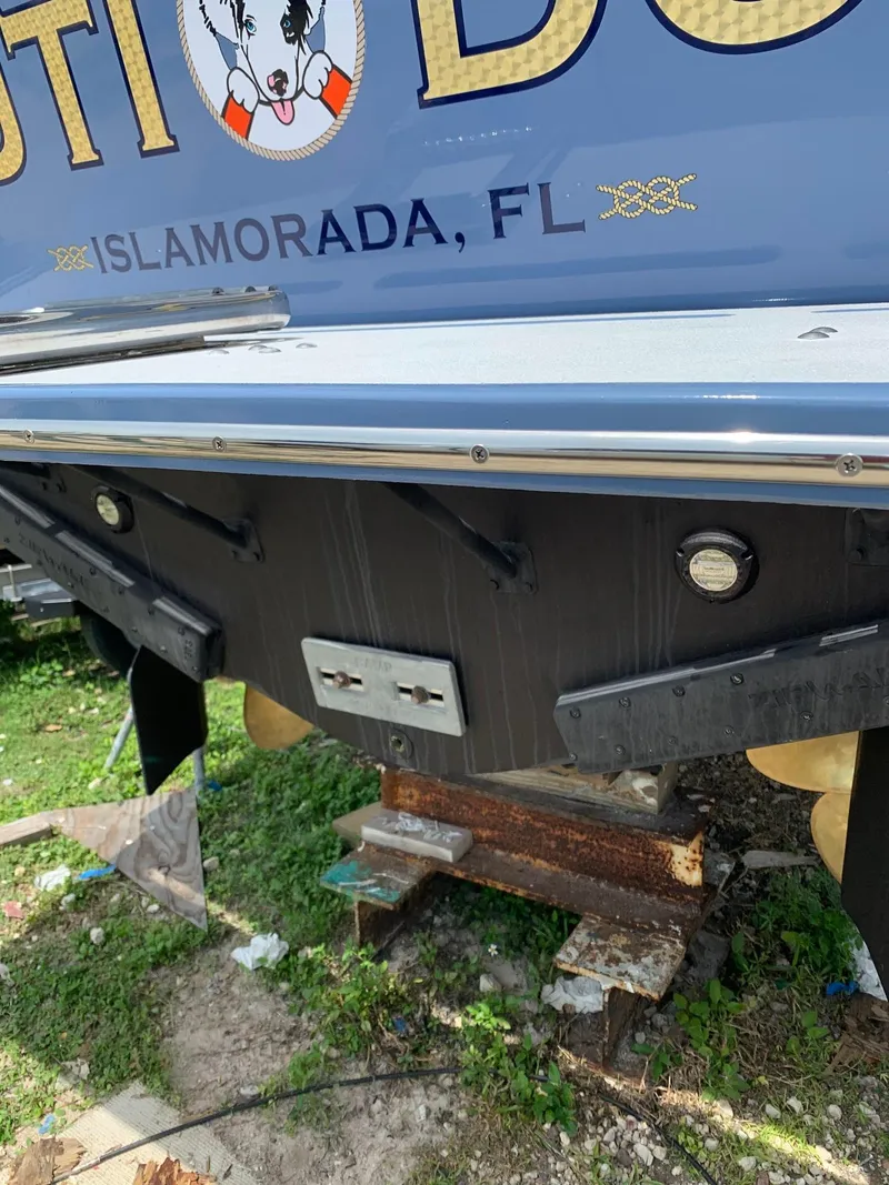 Slide: The Image of 1974 Bertram 31 Flybridge Cruiser, Islamorada, FL, rear view on blocks. - 20