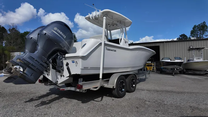 Slide: The Image of 2020 Tidewater 252 CC Adventure boat on trailer with Yamaha outboard motor. - 16