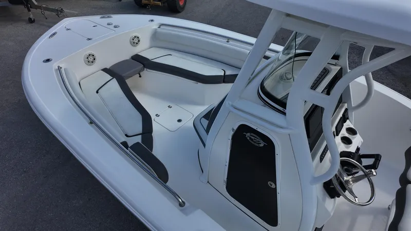 Slide: The Image of 2020 Tidewater 252 CC Adventure boat with spacious seating and modern console design. - 30