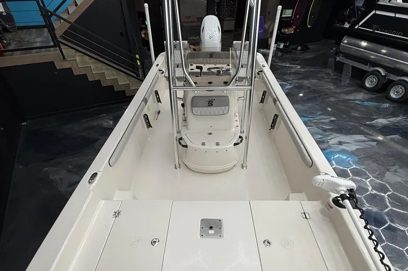 Slide: The Image of 2024 Carolina Skiff 21 LS boat interior with center console and modern design. - 7