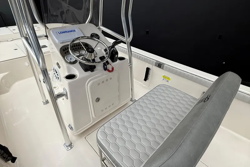 Slide: The Image of 2024 Carolina Skiff 21 LS boat interior with steering console and seating. - 9