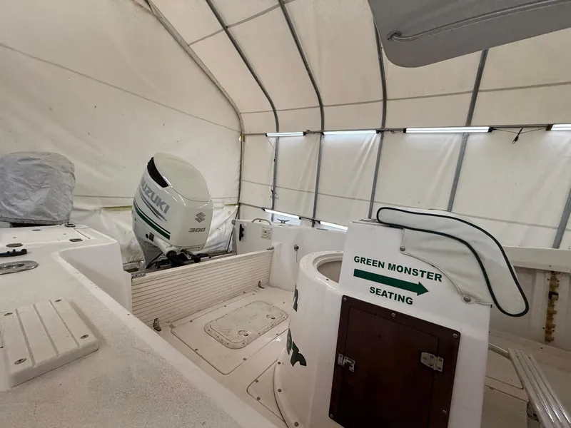 Slide: The Image of Interior of a 1996 Mako 241 boat with "Green Monster" seating. - 8