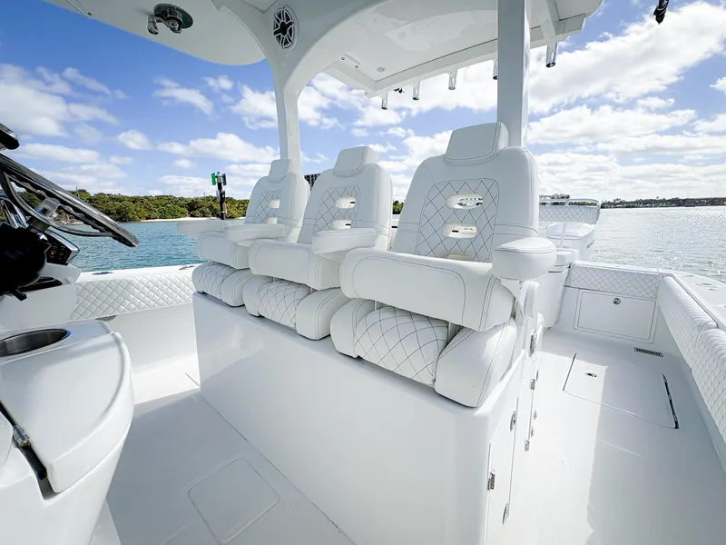 Slide: The Image of Luxurious seating on 2023 HCB 39 Speciale boat, featuring elegant white upholstery. - 20