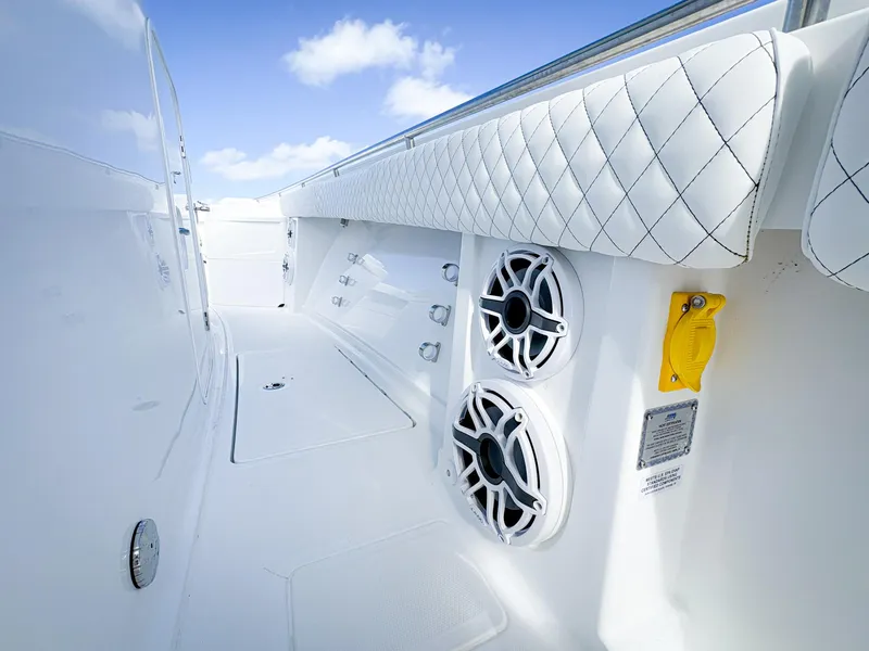 Slide: The Image of 2023 HCB 39 Speciale boat interior with speakers and quilted upholstery. - 34