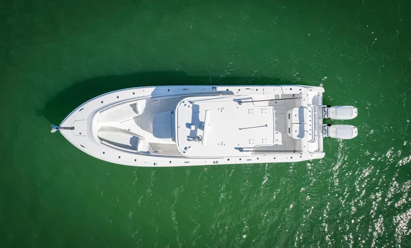 Slide: The Image of Aerial view of 2023 HCB 39 Speciale boat on green water. - 7
