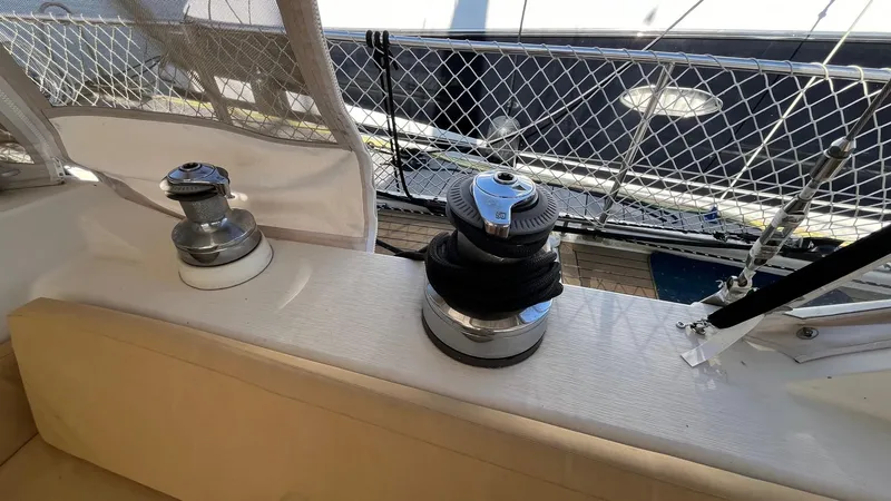 Slide: The Image of Deck view of 1996 Amel Super Maramu-53 sailboat with winches and railing. - 16