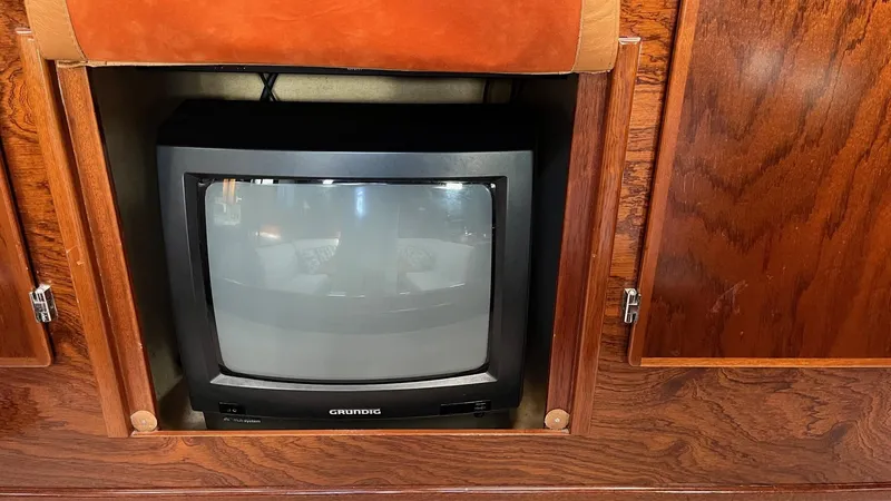 Slide: The Image of Vintage CRT TV in wooden cabinet on 1996 Amel Super Maramu-53 yacht. - 42
