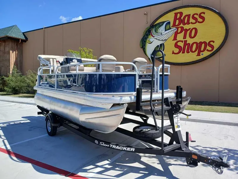 Slide: The Image of 2025 Sun Tracker Bass Buggy 16 XL Select pontoon boat at Bass Pro Shops. - 2