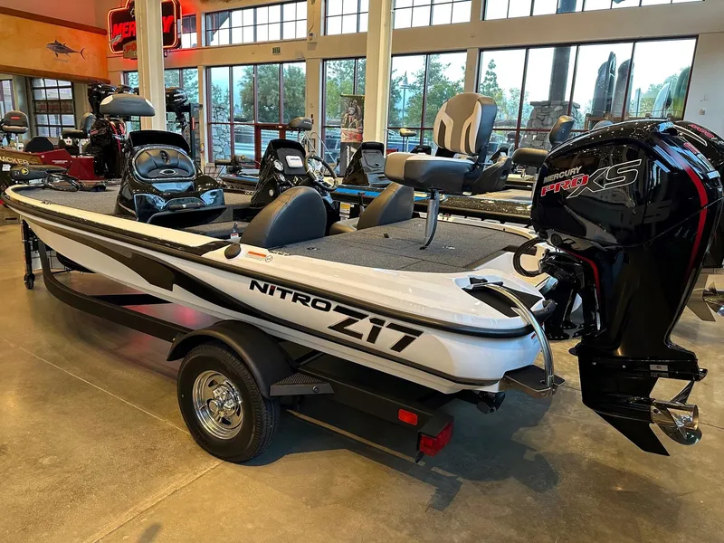 Slide: The Image of 2025 Nitro Z17 boat with Mercury engine displayed in showroom. - 0