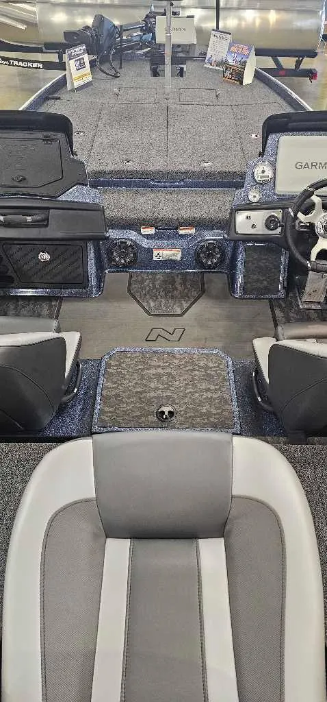 Slide: The Image of 2025 Nitro Z21 XL Pro boat interior with modern dashboard and seating. - 4