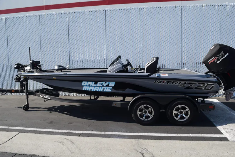 The Image of 2025 Nitro Z20 XL Pro boat on trailer, Galey's Marine branding, parked outdoors. - 0