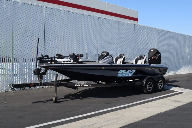 Slide: The Image of 2025 Nitro Z20 XL Pro boat parked on trailer, side view. - 1