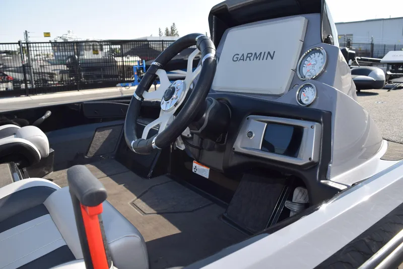Slide: The Image of 2025 Nitro Z20 XL Pro boat dashboard with Garmin navigation system and gauges. - 4