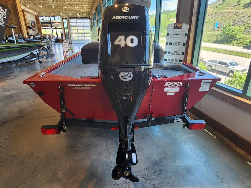 Slide: The Image of 2025 Tracker Pro 170 boat with Mercury 40 engine in showroom. - 4