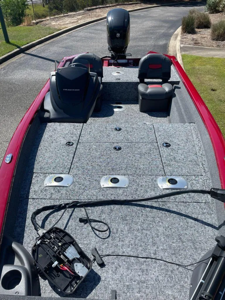 Slide: The Image of 2025 Tracker Pro Team 175 Crappie Edition boat with spacious deck and seating. - 3