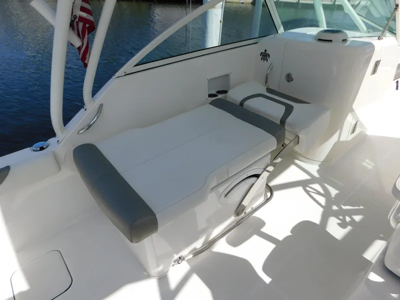 Slide: The Image of 2020 World Cat 230 DC boat interior with comfortable seating and sleek design. - 20