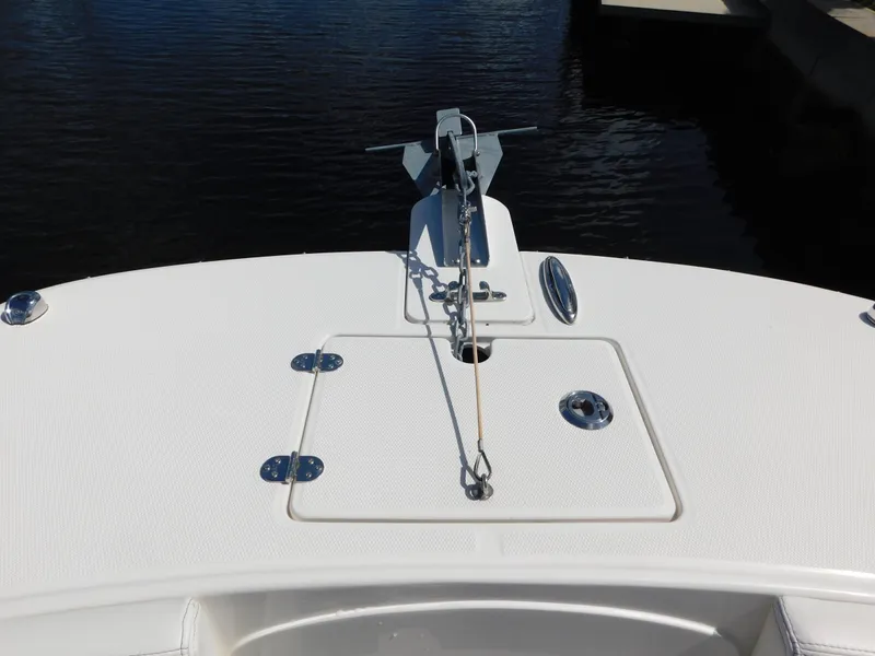 Slide: The Image of Bow of 2020 World Cat 230 DC boat with anchor and hatch. - 31