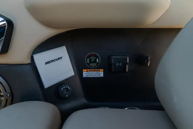 Slide: The Image of Dashboard of 2025 Chris-Craft 25 Sportster with Mercury manual and controls. - 15