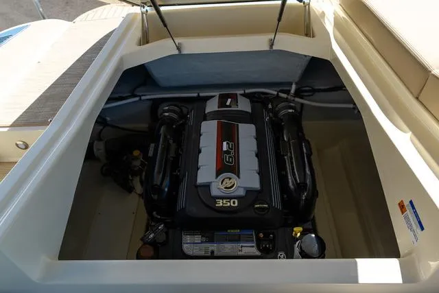 Slide: The Image of 2025 Chris-Craft 25 Sportster engine compartment with powerful 350 horsepower engine. - 8