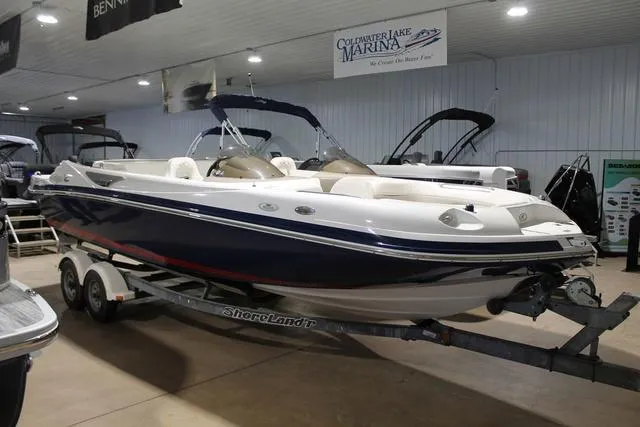 Slide: The Image of 2005 Kayot V220i boat on trailer by lakeside, ready for launch. - 1