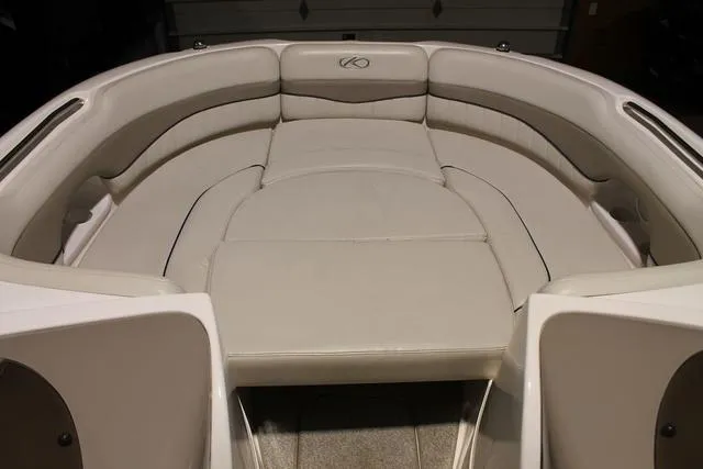 Slide: The Image of Control panel of 2005 Kayot V220i boat showing capacity limit and safety features. - 7