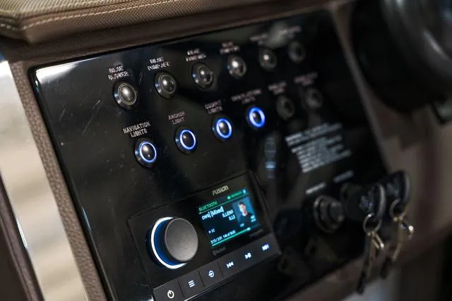 Slide: The Image of Control panel of 2025 Cobalt R33 with illuminated buttons and digital display. - 22