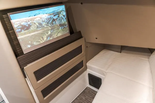 Slide: The Image of Interior of 2025 Cobalt R33 with cozy seating and a mounted screen. - 29