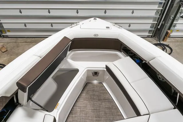 Slide: The Image of 2025 Cobalt R33 boat interior with sleek seating and modern design. - 32