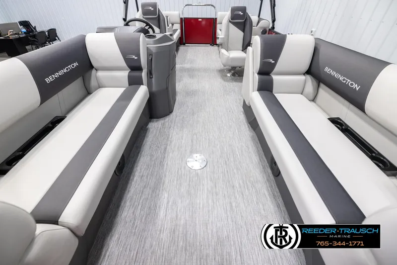 Slide: The Image of 2025 Bennington 22 SSRSE pontoon boat interior with gray seating and modern design. - 13
