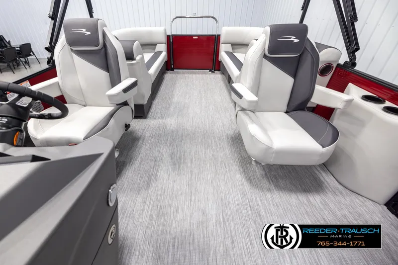 Slide: The Image of 2025 Bennington 22 SSRSE pontoon boat interior with modern seating and sleek design. - 14