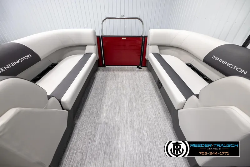 Slide: The Image of 2025 Bennington 22 SSRSE pontoon boat interior with gray seating and red gate. - 15