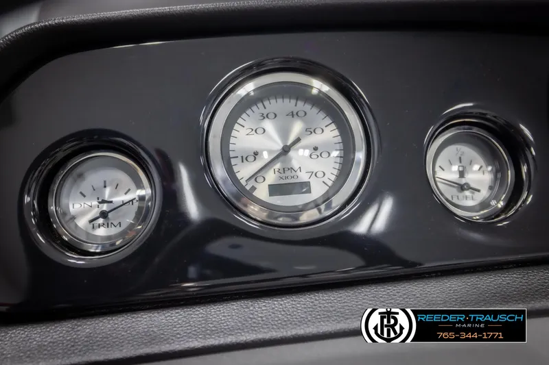 Slide: The Image of Dashboard gauges of 2025 Bennington 22 SSRSE boat, featuring RPM, trim, and fuel indicators. - 28