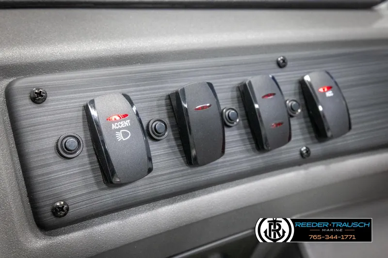 Slide: The Image of Control panel of 2025 Bennington 22 SSRSE boat with accent lighting switches. - 30