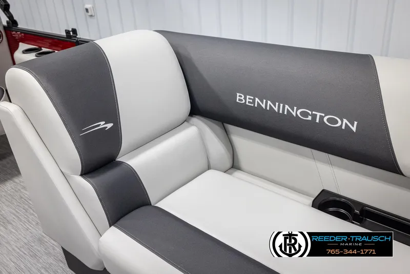 Slide: The Image of 2025 Bennington 22 SSRSE boat seat with logo, featuring sleek gray and white upholstery. - 33