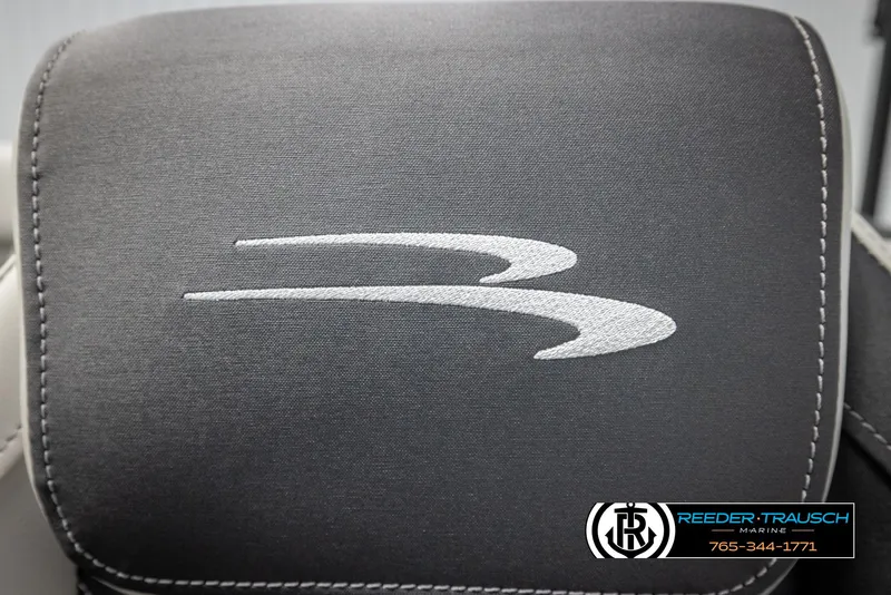Slide: The Image of 2025 Bennington 22 SSRSE seat with logo, featuring Reeder-Trausch Marine branding. - 35