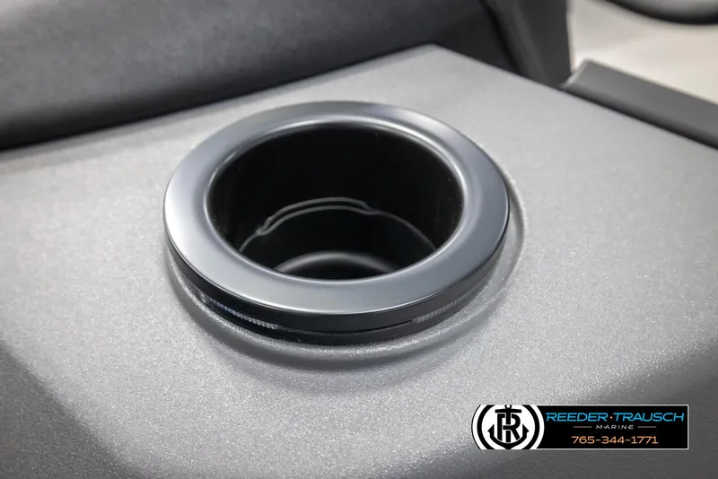Slide: The Image of Cup holder on 2025 Bennington 22 SSRSE boat, Reeder-Trausch Marine logo visible. - 38